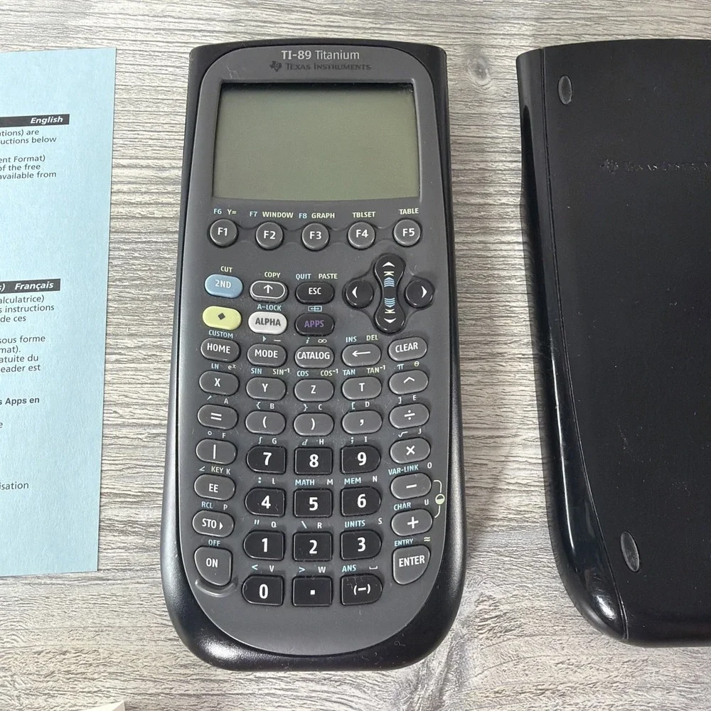 Texas Instruments TI-89 Titanium Graphing Calculator W/ Slide Case & CD Manual